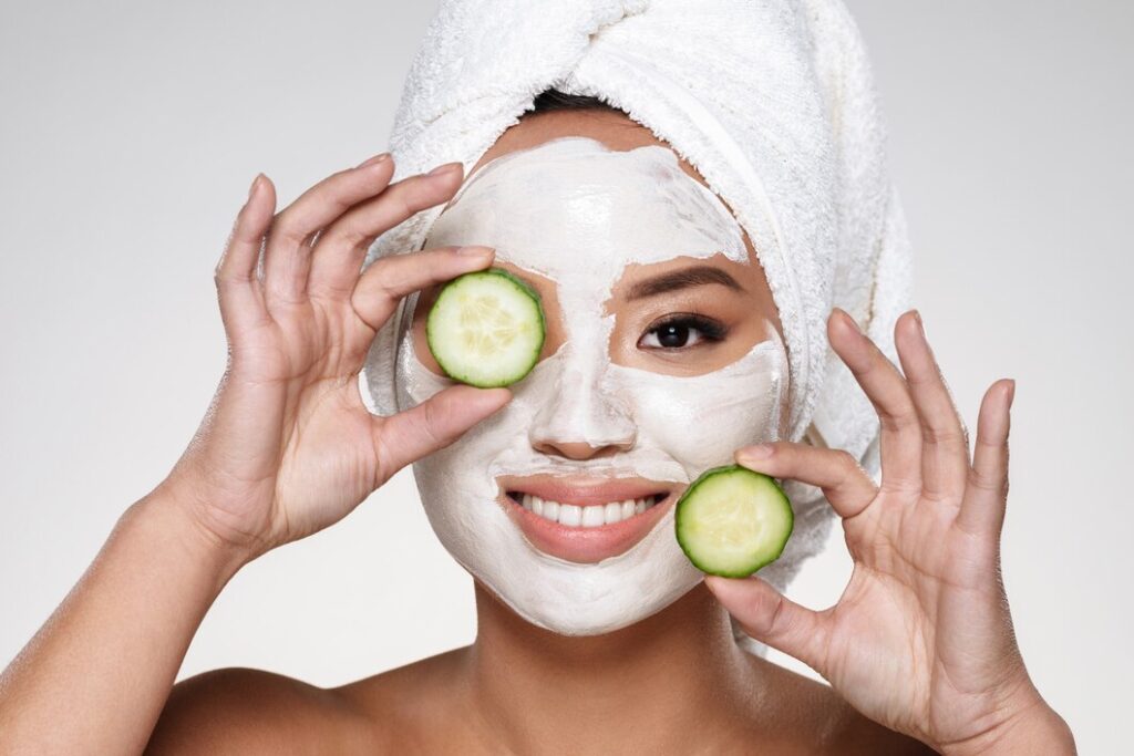 attractive smiling lady with scrab face holding cucumber slices 171337 1796 attractive-smiling-lady-with-scrab-face-holding-cucumber-slices_171337-1796