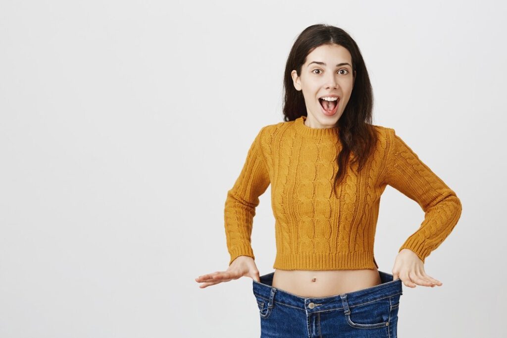 cheerful girl lost weight rejoicing diet worked 176420 25828 cheerful-girl-lost-weight-rejoicing-diet-worked_176420-25828
