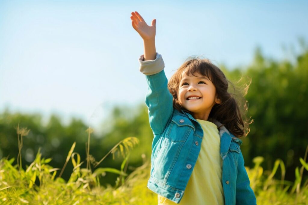 young girl field raising hand up 23 2151031856 young-girl-field-raising-hand-up_23-2151031856