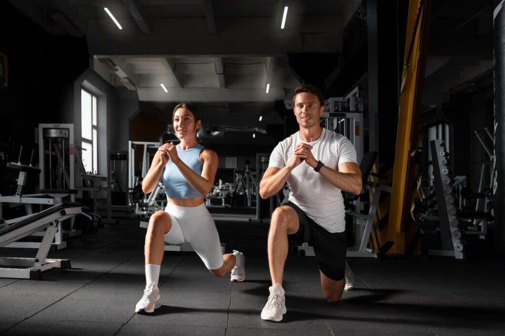 woman helping man gym 23 2149627073 woman-helping-man-gym_23-2149627073