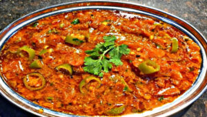 If you’re tired of boring food, try something new! Make Rajasthani Tamatar Mirch ke Tipore at home, learn the recipe