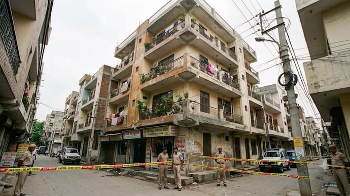 A four-story building in Delhi tilted, forcing residents to evacuate in fear.